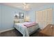 Comfortable bedroom featuring carpet and ample natural light at 1723 Needle Palm Dr, Edgewater, FL 32132