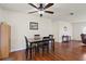Elegant dining area with hardwood floors and a classic dining set at 1723 Needle Palm Dr, Edgewater, FL 32132