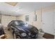 Attached garage featuring a car, automatic door, and ample space for parking and storage at 1723 Needle Palm Dr, Edgewater, FL 32132