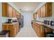 Well-lit kitchen with plentiful cabinetry and stainless steel appliances at 1723 Needle Palm Dr, Edgewater, FL 32132