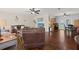 Spacious living room flowing into dining area with ample seating at 1723 Needle Palm Dr, Edgewater, FL 32132