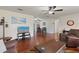 Inviting living room featuring hardwood floors and comfortable seating arrangements at 1723 Needle Palm Dr, Edgewater, FL 32132