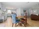 Open concept dining area and living room providing a spacious layout and lots of natural light at 1920 Travelers Palm Dr, Edgewater, FL 32141