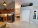 Kitchen view showing stainless appliances, and access to dining area at 1941 Spruce Creek Lndg, Port Orange, FL 32128