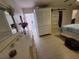 Comfortable main bedroom leads to a bathroom and features a walk-in closet at 1941 Spruce Creek Lndg, Port Orange, FL 32128