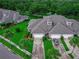 Charming community with beautiful landscaping, mature trees, and water views at 1983 Turnbull Lakes Dr, New Smyrna Beach, FL 32168