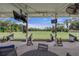 Community golf course hitting range, offering golfers a place to practice and enjoy the outdoors at 1983 Turnbull Lakes Dr, New Smyrna Beach, FL 32168
