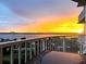 Stunning sunset view from the balcony overlooking the water at 2 Oceans West Blvd # 702, Daytona Beach, FL 32118