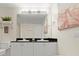 Bathroom featuring a double vanity and decor at 2 Oceans West Blvd # 702, Daytona Beach, FL 32118