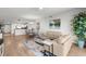 Inviting living room with comfortable seating, wood floors, and an open-concept layout at 2 Oceans West Blvd # 702, Daytona Beach, FL 32118