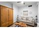 Inviting living room with a sofa, hardwood furniture, and tasteful decor for a cozy atmosphere at 2 Oceans West Blvd # 702, Daytona Beach, FL 32118