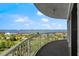 Breathtaking balcony view capturing a picturesque landscape and distant waterfront scenery at 2 Oceans West Blvd # 702, Daytona Beach, FL 32118