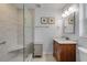 Bathroom featuring a glass enclosed shower, vanity, and modern finishes at 200 W Washington Ave, Deland, FL 32720