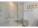 Shower features glass enclosure, shower seating, and modern fixtures at 200 W Washington Ave, Deland, FL 32720