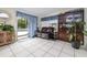 Cozy sitting area with tile floors and sliding glass doors that lead to the backyard at 210 Delespine Dr, Debary, FL 32713