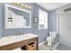 Stylish bathroom with walk-in shower, vanity, and modern fixtures at 2101 Hill St, New Smyrna Beach, FL 32169