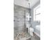 Stylish bathroom with a glass shower, modern toilet, and sink at 2101 Hill St, New Smyrna Beach, FL 32169