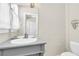 Well-lit bathroom with a modern vanity and ample counter space at 2101 Hill St, New Smyrna Beach, FL 32169