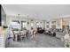 Open living and dining area with ocean views and wood-look flooring at 2101 Hill St, New Smyrna Beach, FL 32169
