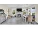 Spacious living area features a fireplace, dining table, and scenic views at 2101 Hill St, New Smyrna Beach, FL 32169