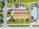 Drone shot of the property highlighting potential lots, parking, and well-maintained landscaping at 2122 S Atlantic Ave # 2122, New Smyrna Beach, FL 32169