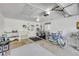 Well-organized garage with laundry area, workbench, and ample storage space for tools and recreational equipment at 2122 S Atlantic Ave # 2122, New Smyrna Beach, FL 32169
