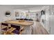 Open concept kitchen and living room with an island and comfortable seating at 2122 S Atlantic Ave # 2122, New Smyrna Beach, FL 32169