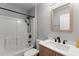 Well-lit bathroom with a tub-shower combination and a modern vanity at 2325 Lime Tree Dr, Edgewater, FL 32141