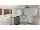 Open-concept kitchen with new appliances, granite countertops and adjacent breakfast area, making it perfect for modern living at 2325 Lime Tree Dr, Edgewater, FL 32141