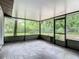 Spacious screened patio overlooking private backyard at 2628 Vista Palm Dr, Edgewater, FL 32141