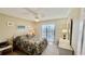 Bedroom featuring a view of the harbor, ceiling fan, and comfy bed at 2700 N Peninsula Ave # 322, New Smyrna Beach, FL 32169