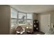 Bedroom water view with bright light and comfortable seating at 2700 N Peninsula Ave # 322, New Smyrna Beach, FL 32169