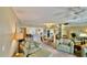 Open floor plan living room with access to kitchen and comfortable seating at 2700 N Peninsula Ave # 322, New Smyrna Beach, FL 32169