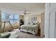 Comfortable main bedroom with bay window and water view at 2700 N Peninsula Ave # 322, New Smyrna Beach, FL 32169