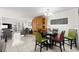 Bright dining area with table and chairs; great for entertaining guests at 2711 N Halifax Ave # 372, Daytona Beach, FL 32118