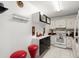 Efficient kitchen with modern appliances and white cabinets at 2711 N Halifax Ave # 372, Daytona Beach, FL 32118