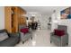 Spacious living room area showcasing contemporary furnishings and a view of the dining space at 2711 N Halifax Ave # 372, Daytona Beach, FL 32118