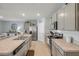 Spacious kitchen with stainless steel appliances, light cabinetry, and a subway tile backsplash at 2733 Neverland Dr, New Smyrna Beach, FL 32168