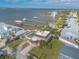 Aerial view of home showing pool, waterfront location and private dock at 2900 S Peninsula Dr, Daytona Beach, FL 32118