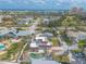 Aerial view of house showcasing backyard pool and nearby beach at 2900 S Peninsula Dr, Daytona Beach, FL 32118