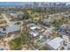 Aerial view of house with backyard pool and lounge area, surrounded by lush landscaping at 2900 S Peninsula Dr, Daytona Beach, FL 32118