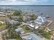 Waterfront neighborhood aerial view featuring backyard dock and boat lift at 2900 S Peninsula Dr, Daytona Beach, FL 32118