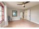Bedroom featuring neutral walls, ceiling fan and double mirrored closet doors at 2900 S Peninsula Dr, Daytona Beach, FL 32118