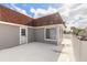 Well-maintained rooftop deck with a white door and windows, offering a stylish outdoor space at 2900 S Peninsula Dr, Daytona Beach, FL 32118
