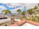 Scenic waterfront with palm trees, private dock, and the open water perfect for boating enthusiasts at 2900 S Peninsula Dr, Daytona Beach, FL 32118