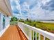 Balcony view boasting serene waterfront scenery and scenic views at 2950 Sunset Dr, New Smyrna Beach, FL 32168