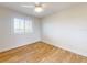 Cozy bedroom with great natural light, wood floors, and shuttered windows at 2950 Sunset Dr, New Smyrna Beach, FL 32168