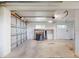 Garage featuring a roll up door and concrete floor at 2950 Sunset Dr, New Smyrna Beach, FL 32168