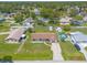 Aerial view of the home with fenced yard at 3044 Pine Tree Dr, Edgewater, FL 32141