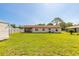 Wide view of house from backyard at 3044 Pine Tree Dr, Edgewater, FL 32141